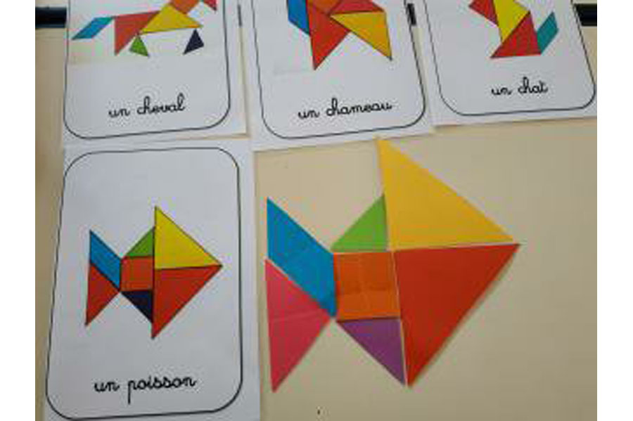 Le jeu du Tangram : jeu de reconnaissance des formes et des couleurs.